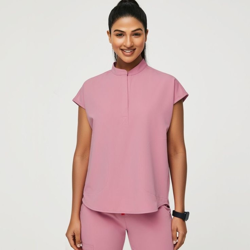 FIGS. Women’s scrub top, Rafaela. Limited edition color Chalk Pink.